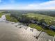 Marsh views from above, showing community homes with deep water docks at 3121 Marshgate Dr, Seabrook Island, SC 29455