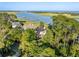 Home surrounded by mature trees has waterway views and private docks at 3121 Marshgate Dr, Seabrook Island, SC 29455