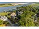 Several waterfront homes can be seen from an aerial view with private docks at 3121 Marshgate Dr, Seabrook Island, SC 29455