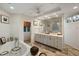 This beautiful bathroom has dual sinks and a stand alone soaking tub at 3121 Marshgate Dr, Seabrook Island, SC 29455
