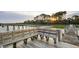 Scenic dock view with built-in seating, providing a perfect spot to relax and enjoy waterfront sunsets at 3121 Marshgate Dr, Seabrook Island, SC 29455
