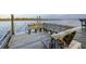 Relaxing waterfront dock featuring a built-in bench, perfect for enjoying serene views and peaceful moments at 3121 Marshgate Dr, Seabrook Island, SC 29455
