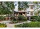 Elegant two-story home with beautiful landscaping, a charming entrance, and a convenient garage on the side at 3121 Marshgate Dr, Seabrook Island, SC 29455