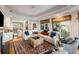 Inviting living room with natural light, hardwood floors, and cozy seating arrangements at 3121 Marshgate Dr, Seabrook Island, SC 29455