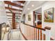 This staircase has wood treads and white risers with dark wood trim at 3121 Marshgate Dr, Seabrook Island, SC 29455