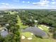 Breathtaking aerial view showcasing a golf course, lush greenery, and scenic water features enhancing the landscape at 3226 Waverly Ln, Johns Island, SC 29455