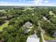 Aerial view of the community, showcasing lush golf course and mature trees at 3226 Waverly Ln, Johns Island, SC 29455