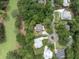 Aerial view of a neighborhood featuring tree-lined streets, well-maintained homes, and lush landscaping at 3226 Waverly Ln, Johns Island, SC 29455