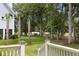 Beautiful backyard featuring lush greenery, mature trees, and manicured landscaping offering a serene outdoor space at 3226 Waverly Ln, Johns Island, SC 29455