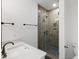 Bathroom showcases a modern glass-enclosed shower, sleek fixtures, and white countertops at 3226 Waverly Ln, Johns Island, SC 29455