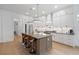 Modern kitchen featuring a large island with bar seating, sleek countertops, stainless steel appliances, and ample cabinetry at 3226 Waverly Ln, Johns Island, SC 29455