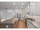 Contemporary kitchen with a functional island, stainless steel appliances, and stylish fixtures providing ample counter space at 3226 Waverly Ln, Johns Island, SC 29455