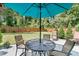 Spacious backyard featuring a well-maintained lawn and patio with seating at 3257 Heathland Way, Mount Pleasant, SC 29466