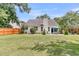 Spacious, private backyard with lush grass and a tall wooden fence at 3257 Heathland Way, Mount Pleasant, SC 29466