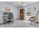 Office space includes two monitors, rolling chair, book shelf, and a window with lots of natural light at 3257 Heathland Way, Mount Pleasant, SC 29466
