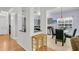 Open dining area with a view into the kitchen and includes a breakfast bar with seating at 3257 Heathland Way, Mount Pleasant, SC 29466