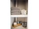 Built-in bathroom shelves featuring organized towels and toiletries at 3480 Johan Blvd, Johns Island, SC 29455