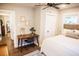Bright bedroom with modern furniture, a study space, and stylish decor at 3480 Johan Blvd, Johns Island, SC 29455