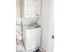 Compact laundry area with stacked washer and dryer at 3480 Johan Blvd, Johns Island, SC 29455