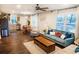 Inviting living room featuring stylish furniture, a large window, and seamless access to the kitchen at 3480 Johan Blvd, Johns Island, SC 29455