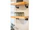 Stylish kitchen shelving with decorative glasses for storage needs at 3480 Johan Blvd, Johns Island, SC 29455