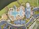 Aerial view of a community pool with a winding layout, modern amenities, and ample parking at 357 Parish Farms Dr, Summerville, SC 29486