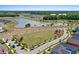 Aerial view of community with green space, a lake, walking trails, and a residential area at 357 Parish Farms Dr, Summerville, SC 29486