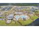 Aerial view features a resort-style pool, extensive landscaping, recreational areas, and newly developed homes at 357 Parish Farms Dr, Summerville, SC 29486