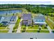Lovely homes with a lush green backdrop and pond views from an aerial perspective at 357 Parish Farms Dr, Summerville, SC 29486