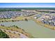 Aerial view showcasing the community with a lake, walking trails, and residential area at 357 Parish Farms Dr, Summerville, SC 29486