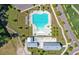 Aerial view showcasing the community pool, pool house, playground, and lounge chairs at 357 Parish Farms Dr, Summerville, SC 29486