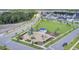 An aerial view showcasing a community playground with green space, play equipment, and shade shelter at 357 Parish Farms Dr, Summerville, SC 29486