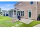 Charming backyard featuring a screened-in porch, lush lawn, and easy access to outdoor enjoyment at 357 Parish Farms Dr, Summerville, SC 29486