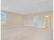 Bright bonus room with neutral walls, plush carpeting and entry to bath and hallway at 357 Parish Farms Dr, Summerville, SC 29486