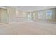 Open bonus room with stairs, access to balcony, and multiple windows for ample light at 357 Parish Farms Dr, Summerville, SC 29486