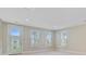 Upstairs bonus room features door to balcony and multiple windows providing natural light at 357 Parish Farms Dr, Summerville, SC 29486