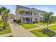 Charming two-story home featuring a double porch and well-manicured landscaping at 357 Parish Farms Dr, Summerville, SC 29486