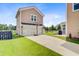 Detached two-car garage with basketball hoop and extra storage space, located on well-maintained lawn at 357 Parish Farms Dr, Summerville, SC 29486