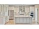 Modern kitchen with stainless steel appliances, granite countertops, a kitchen island, and ample cabinetry at 357 Parish Farms Dr, Summerville, SC 29486