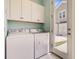 Laundry room with washer and dryer and view of the backyard at 357 Parish Farms Dr, Summerville, SC 29486