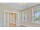 Bright living room with french doors, transom windows, and recessed lighting at 357 Parish Farms Dr, Summerville, SC 29486