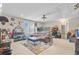 Spacious living room featuring a comfortable seating area, fish tank, and stainless steel fridge at 357 Parish Farms Dr, Summerville, SC 29486