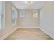 Sun-filled office with wood floors, neutral walls, and transom windows at 357 Parish Farms Dr, Summerville, SC 29486