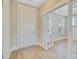 Inviting office with glass french doors and natural light, boasting light wood flooring at 357 Parish Farms Dr, Summerville, SC 29486