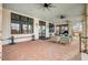 Charming covered patio with comfortable seating and beautiful brick flooring at 357 Parish Farms Dr, Summerville, SC 29486