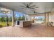 Outdoor lounge area featuring a kitchen with a bar, seating, and views of the pool at 357 Parish Farms Dr, Summerville, SC 29486