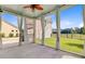 Inviting screened-in porch offers views of the fenced-in yard and private outdoor space at 357 Parish Farms Dr, Summerville, SC 29486