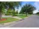 Scenic neighborhood with mature trees, grassy areas, manicured lawns and sidewalks at 357 Parish Farms Dr, Summerville, SC 29486