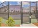 A tennis court enclosed with a secure fence, offering a private playing experience at 357 Parish Farms Dr, Summerville, SC 29486