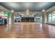 Bright yoga studio with mirrored wall and hardwood floors for a serene exercise environment at 357 Parish Farms Dr, Summerville, SC 29486